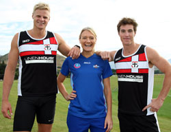Natasha Chokljat with St Kilda AFL team members Nick Riewoldt (left) and Lenny Hayes